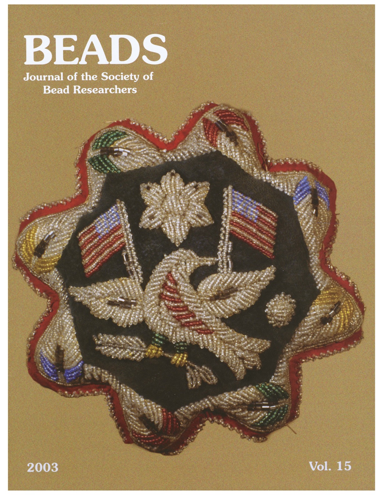 Volume 15 cover, a beadwork medallion featuring American flags.