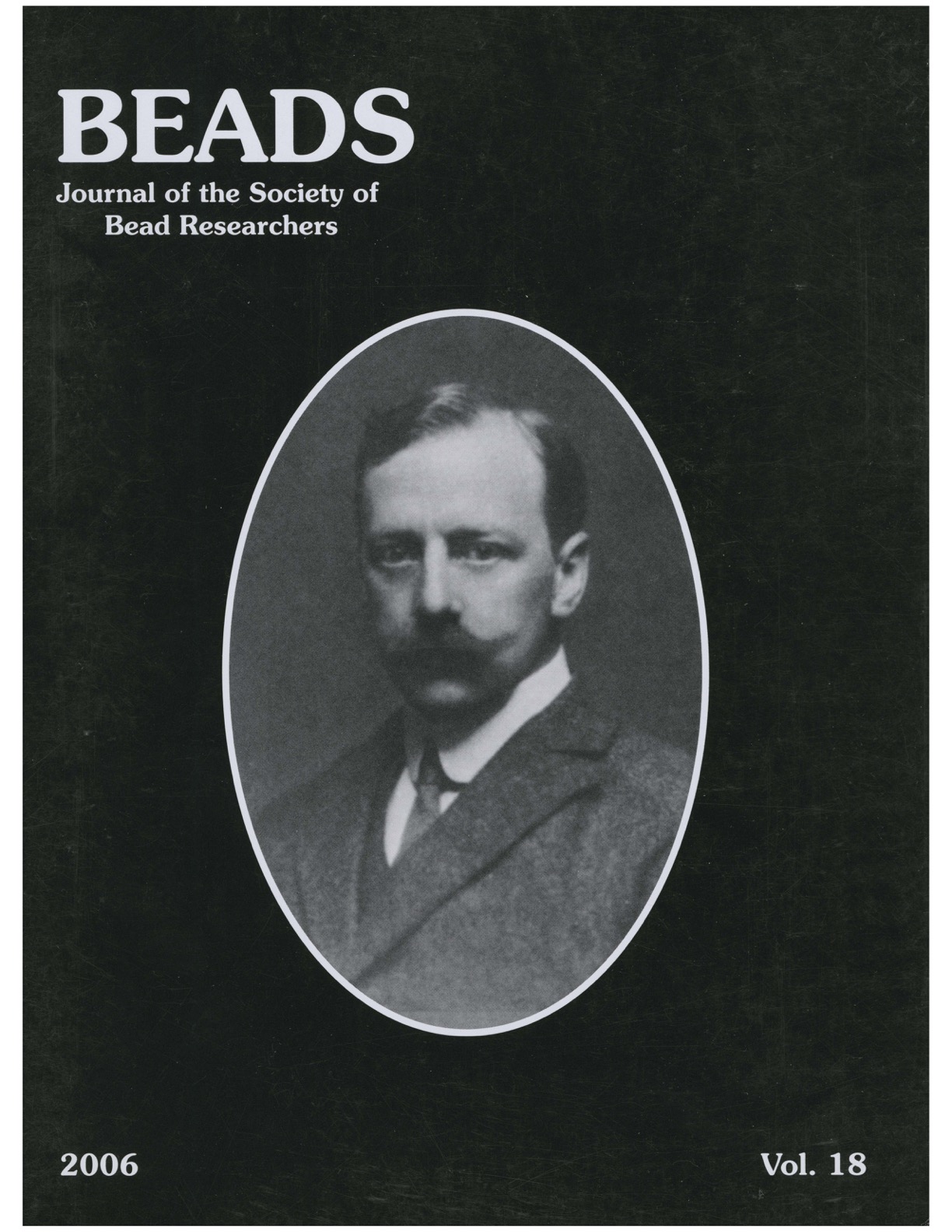 Volume 18 cover, a black and white photo of an early 20th century man in a suit.